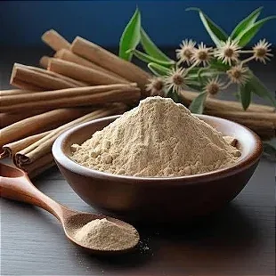 Pale ashwagandha roots and a small heap of root powder